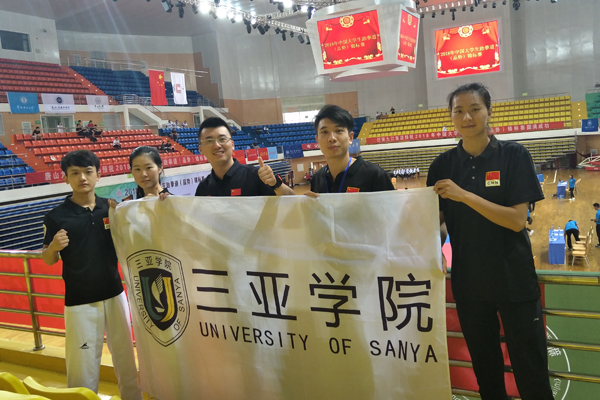体育学院邓越老师带领校跆拳道队参加2018年中国大学生跆拳道品势锦标赛.jpg